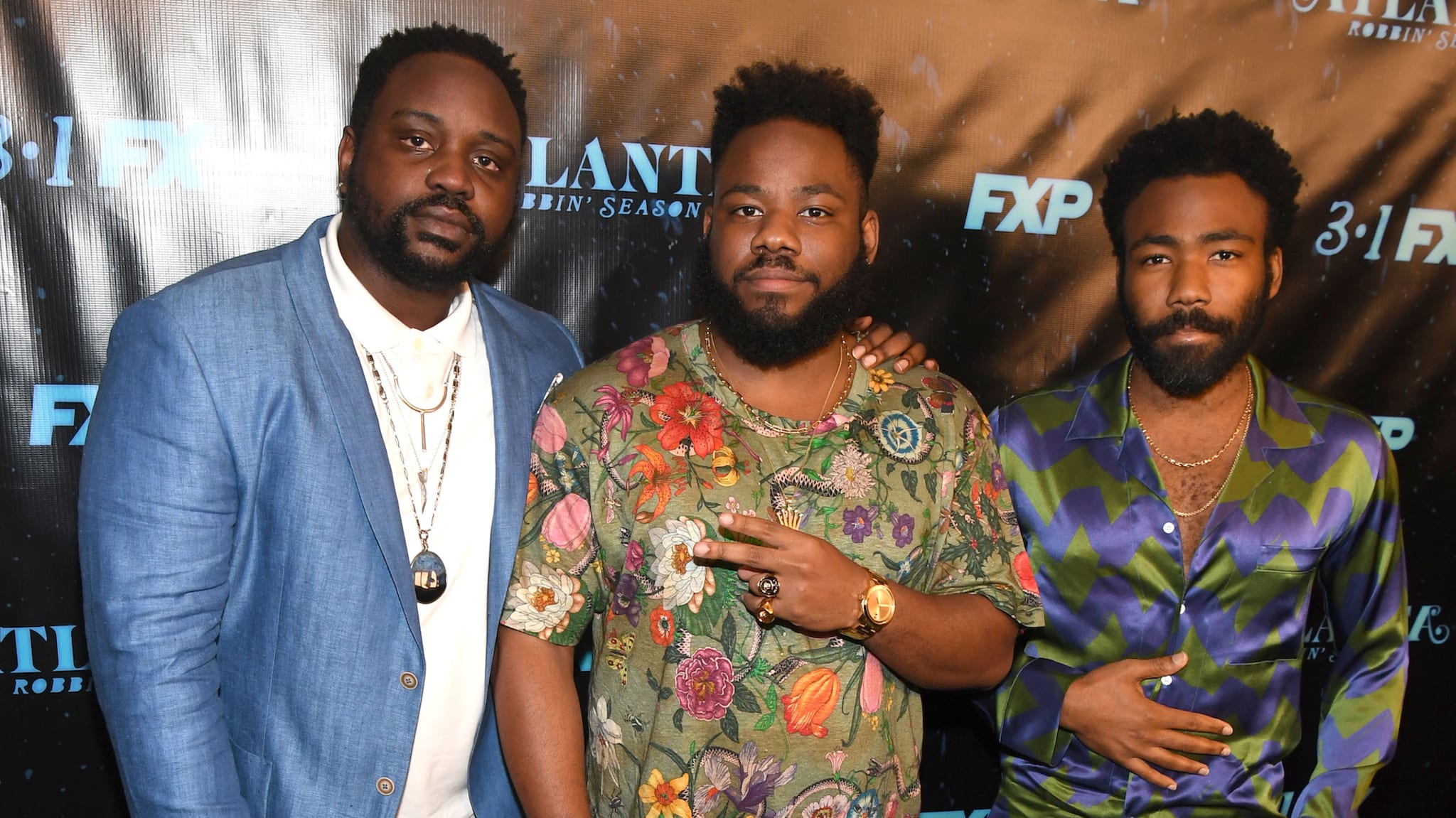 Brian Tyree Henry, Stephen Glover, and Donald Glover attend "Atlanta Robbin' Season" Atlanta Premiere.