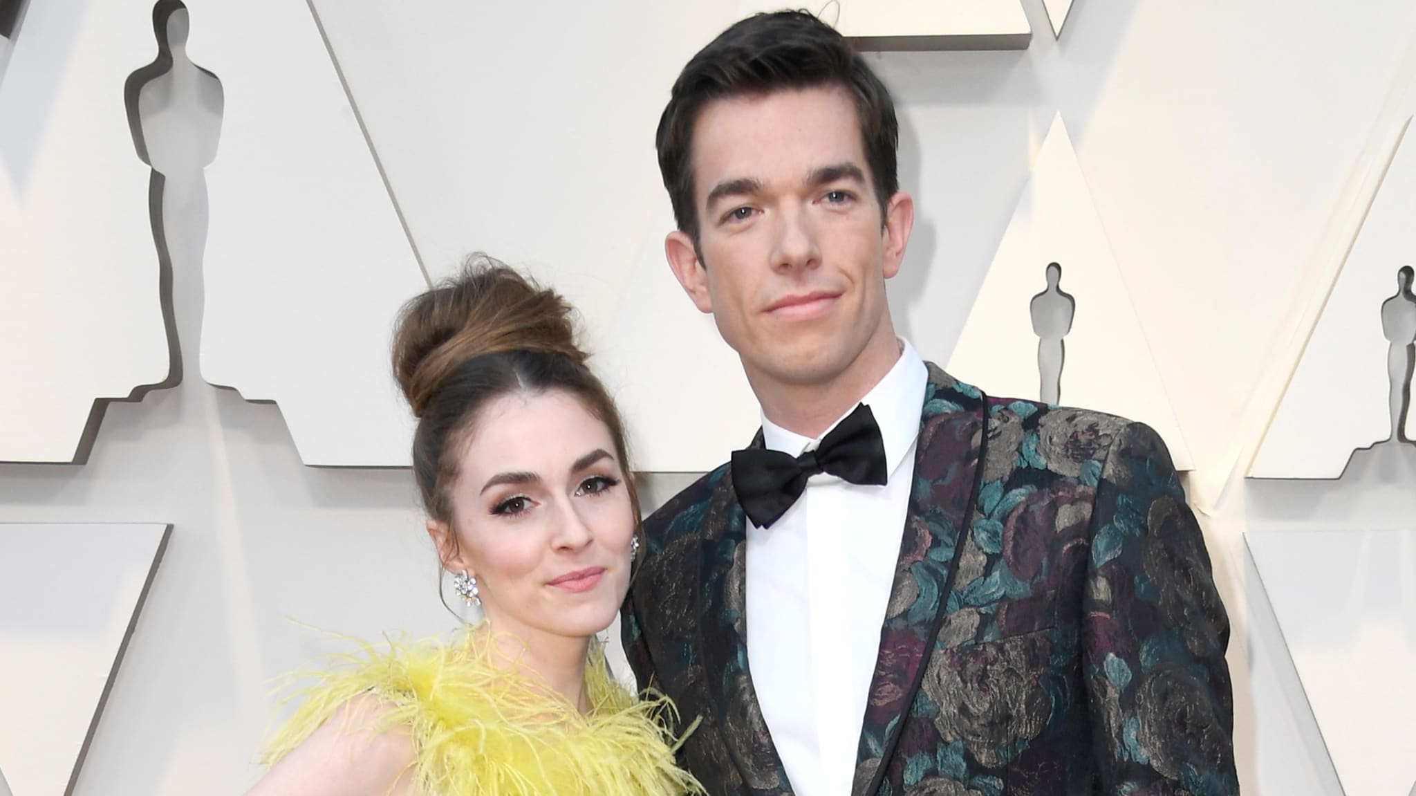 Annamarie Tendler and John Mulaney pose for photo together.