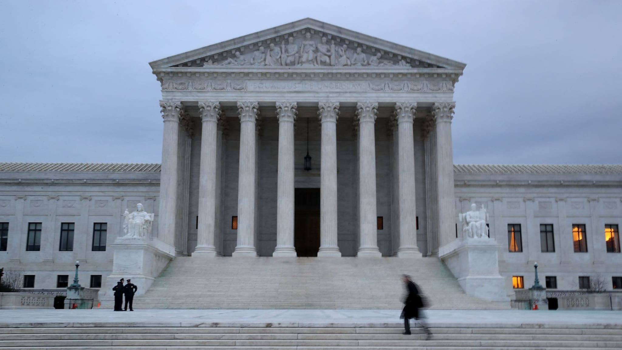 A man walks up the steps of the U.S. Supreme Court
