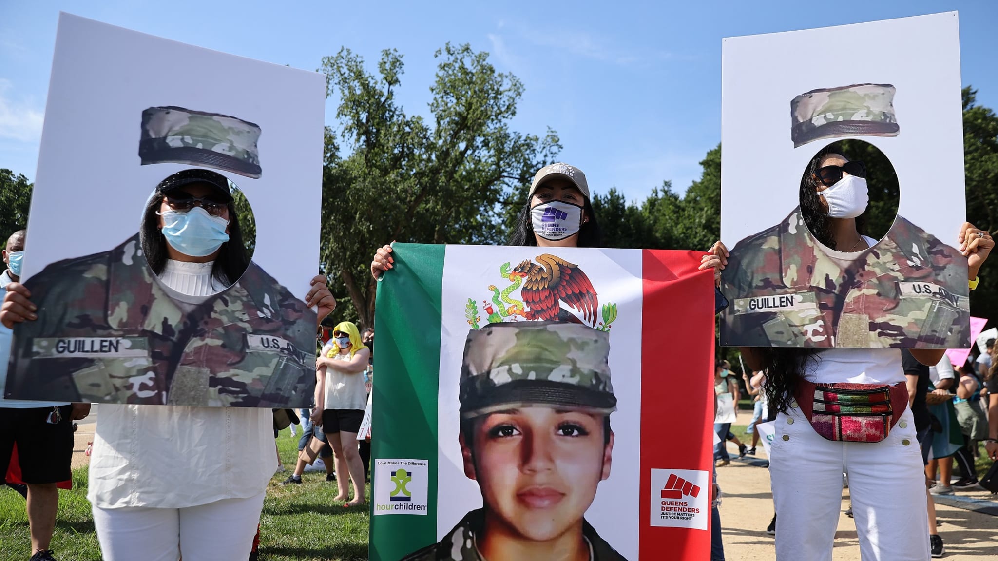 Protestors holding pictures of Vanessa Guillén