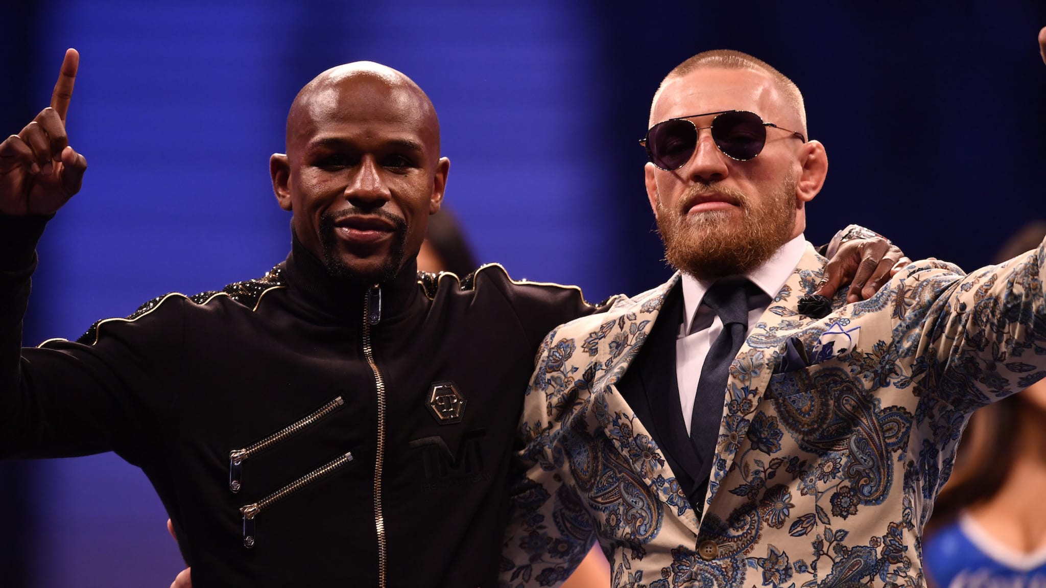 Floyd Mayweather Jr. and Conor McGregor pose for pictures