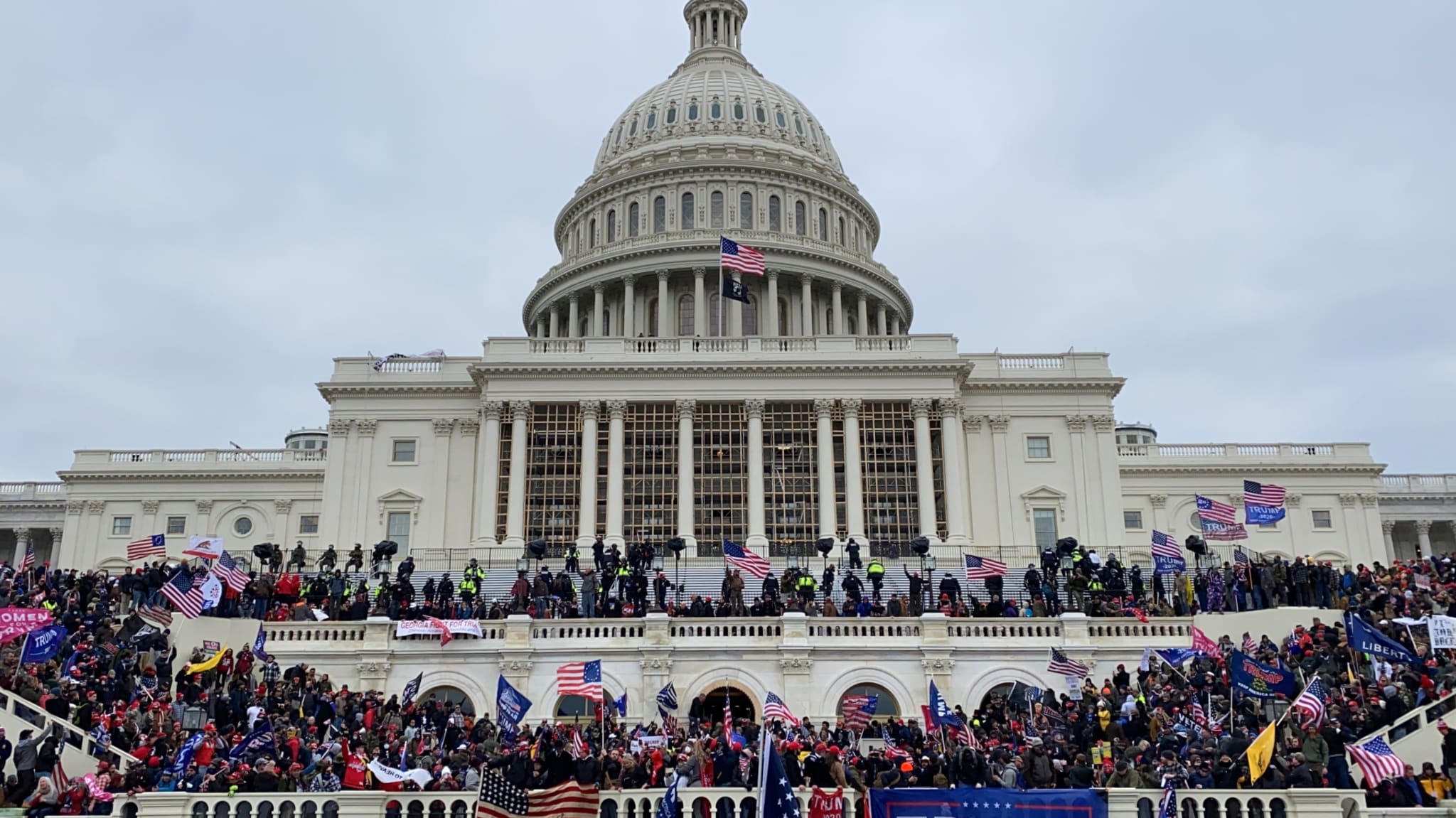 Trump supporters gather outside the Capitol building.