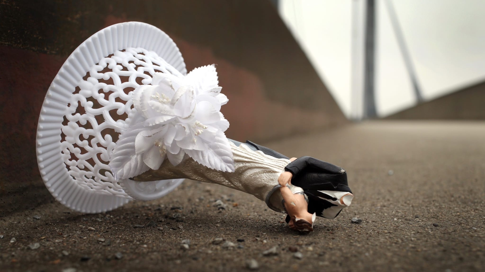 Broken wedding cake topper