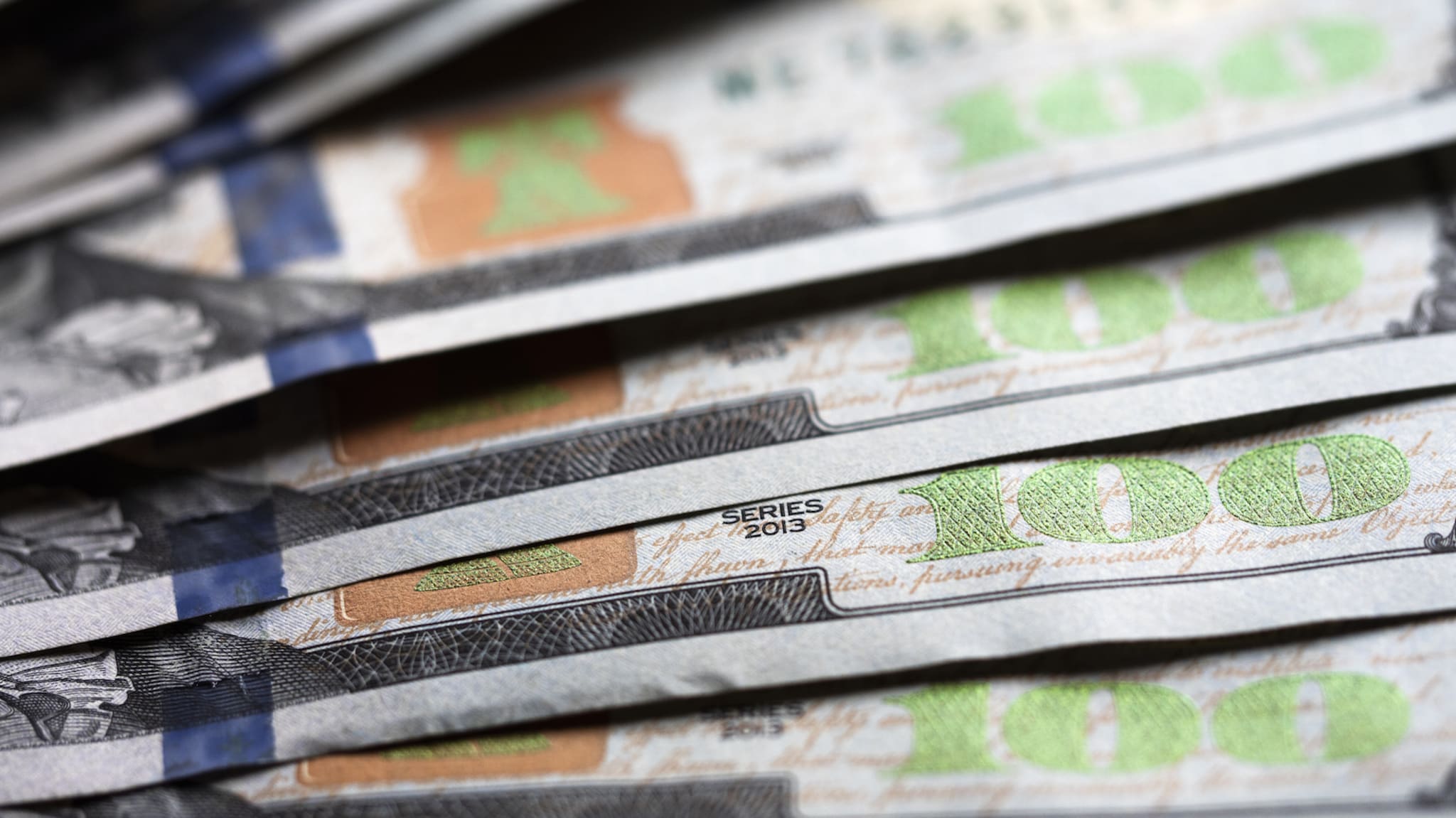 A photo illustration of US 100 dollar bills.