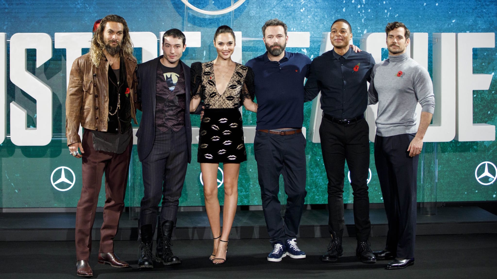 'Justice League' cast pose for a photograph at a photocell.
