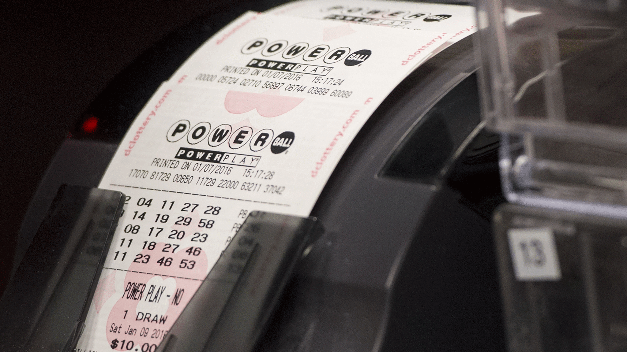 A machine prints Powerball tickets.