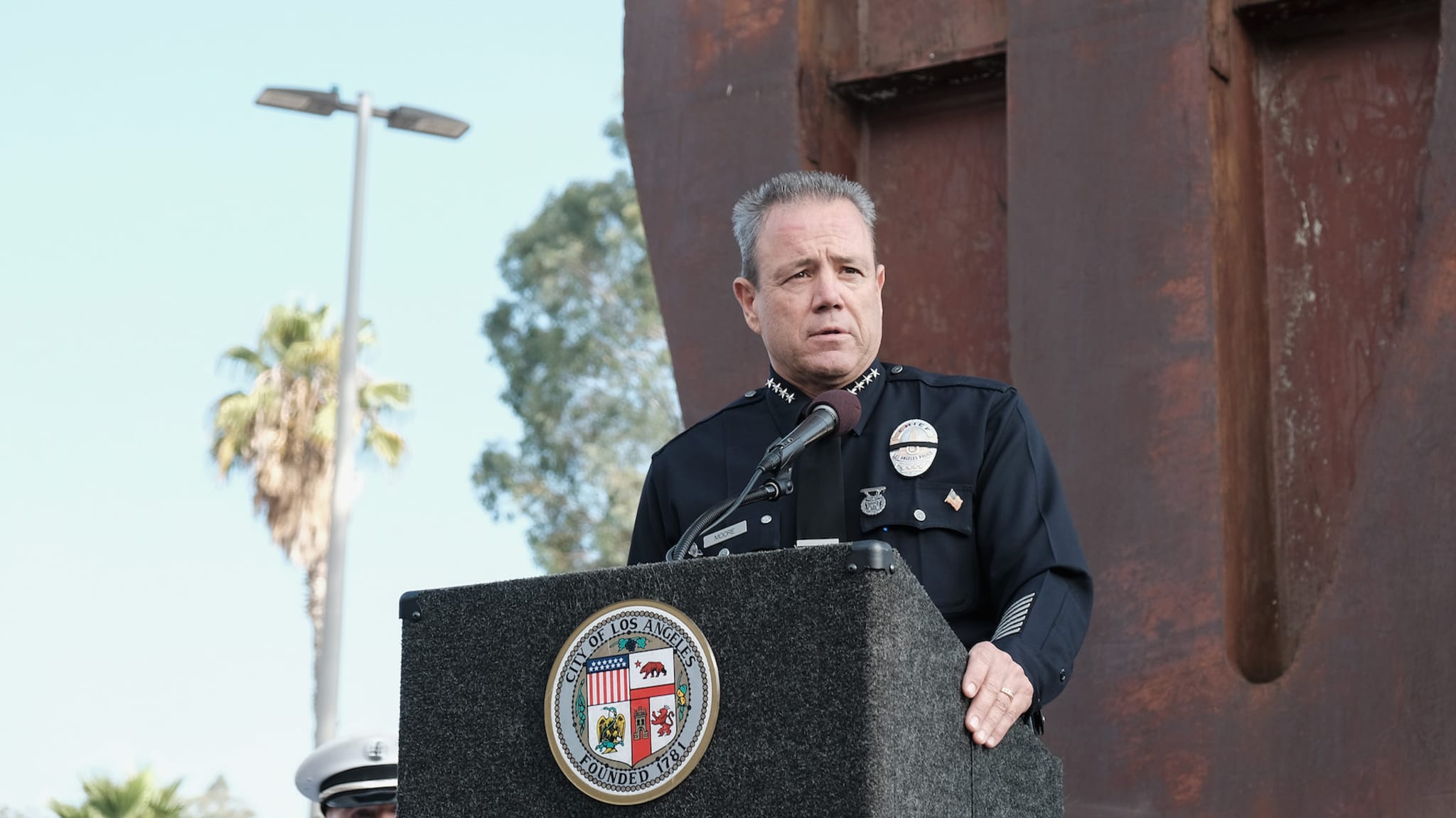 Los Angeles Police Chief Michael Moore speaks during a September 11 memorial.