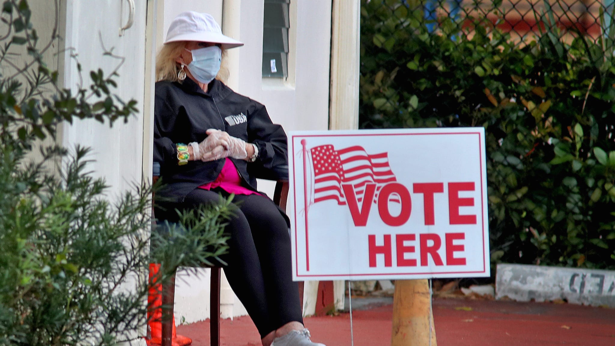 A poll worker at the First Baptist Church voting site in Hollywood, Fla.