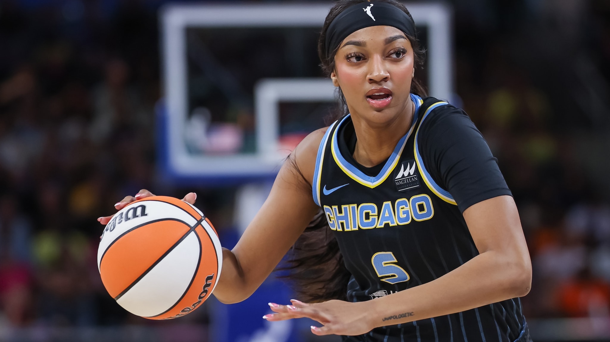 angel reese playing basketball