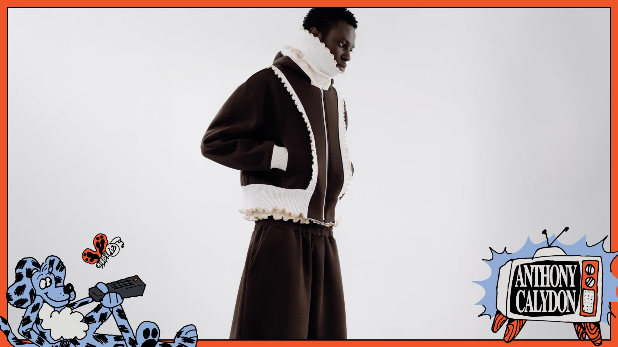 A person models a brown and white outfit with ruffled edges. The image has a cartoon border with a TV displaying "Anthony Calydon."