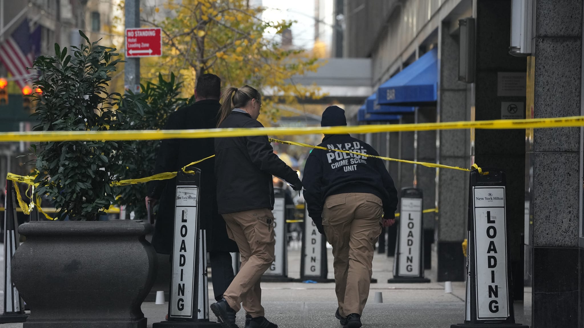 Outside the New York Hilton where 50-year-old UnitedHealthcare CEO Brian Thompson was shot dead.