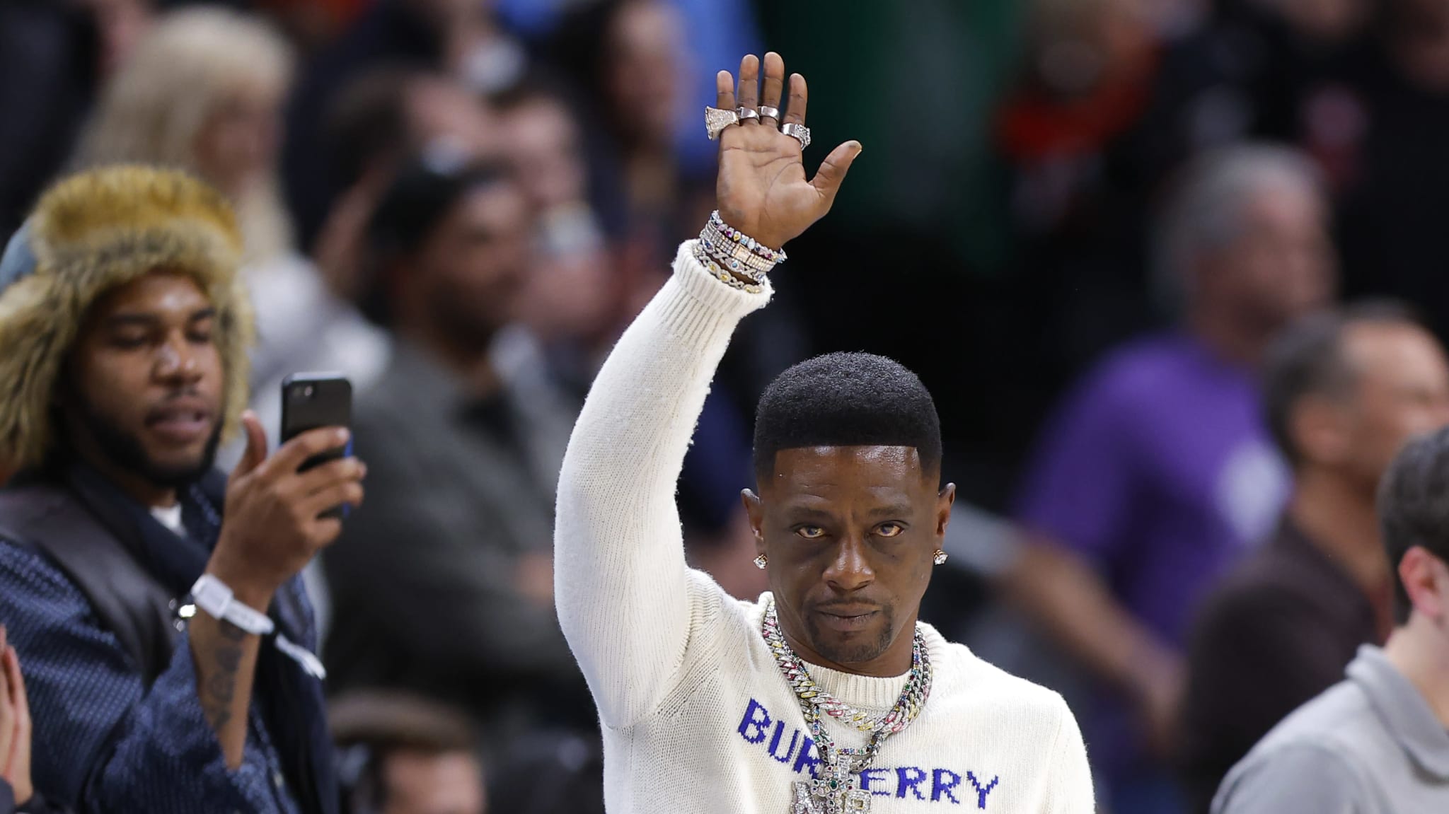Rapper and entertainer Boosie Badazz reacts late in the fourth quarter during the game between the Chicago Bulls and Atlanta Hawks at State Farm Arena on December 26, 2024 in Atlanta, Georgia.