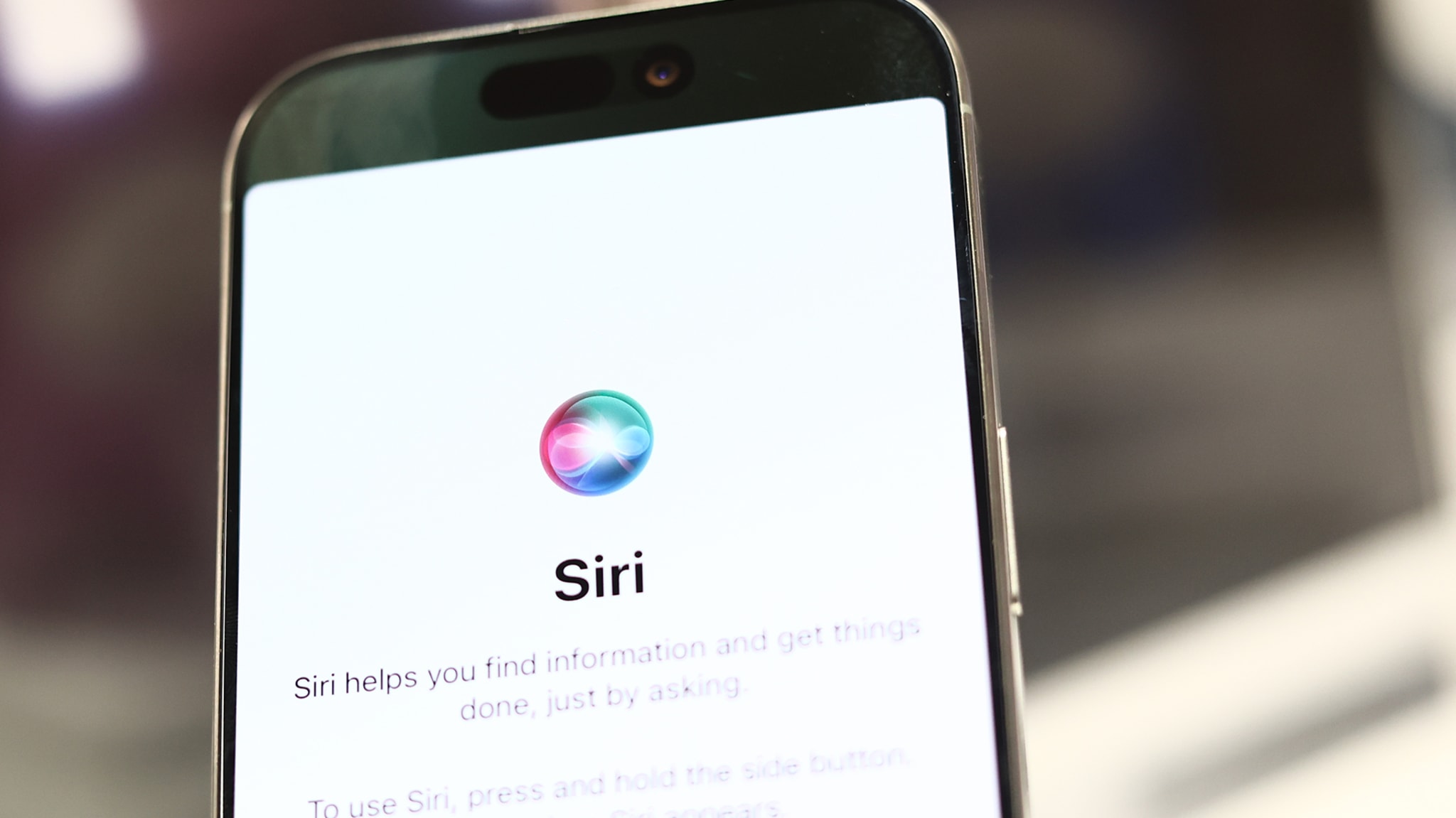 Siri seen on an iphone.