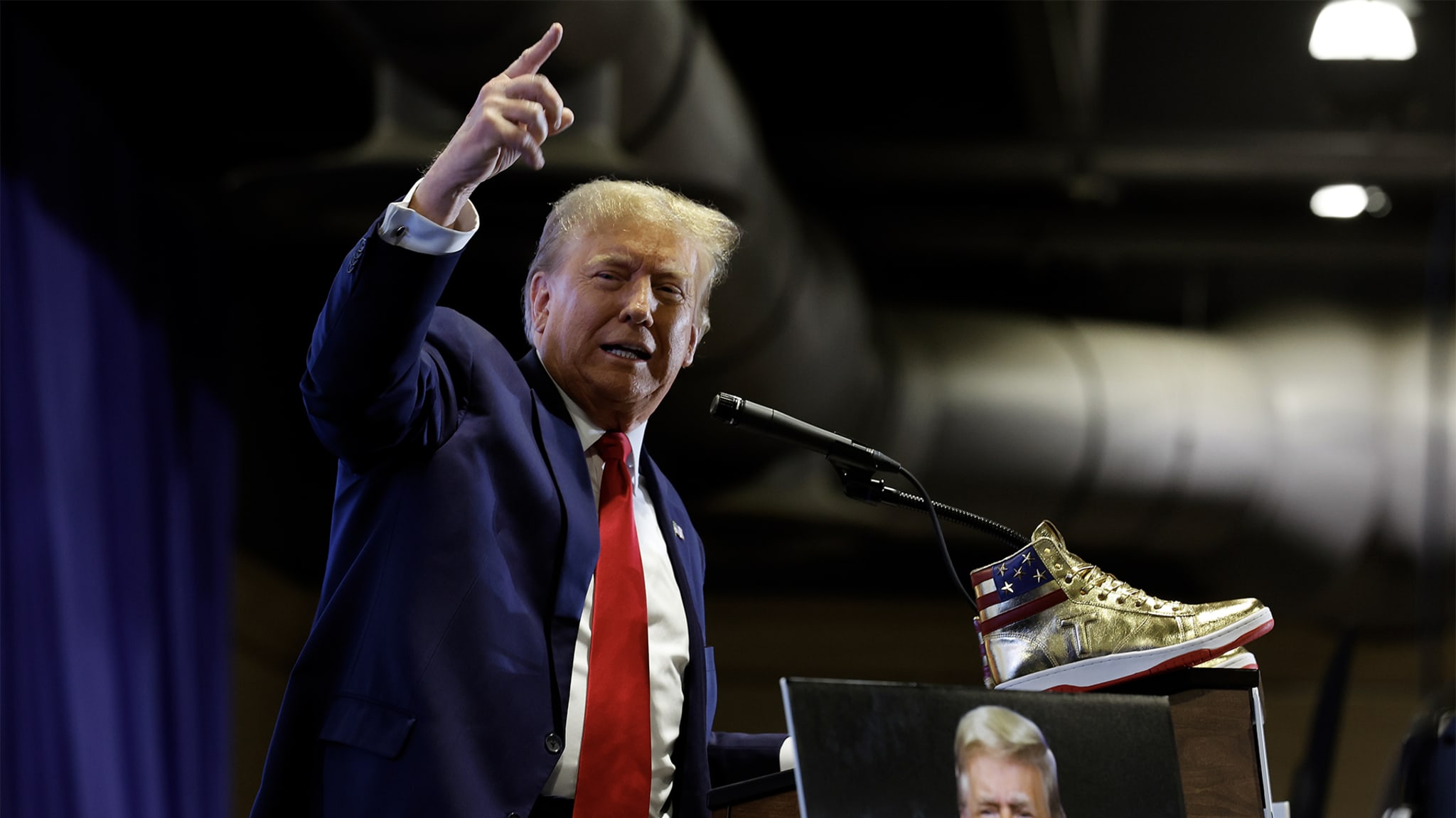 Donald Trump gold sneakers at Sneaker Con Philadelphia