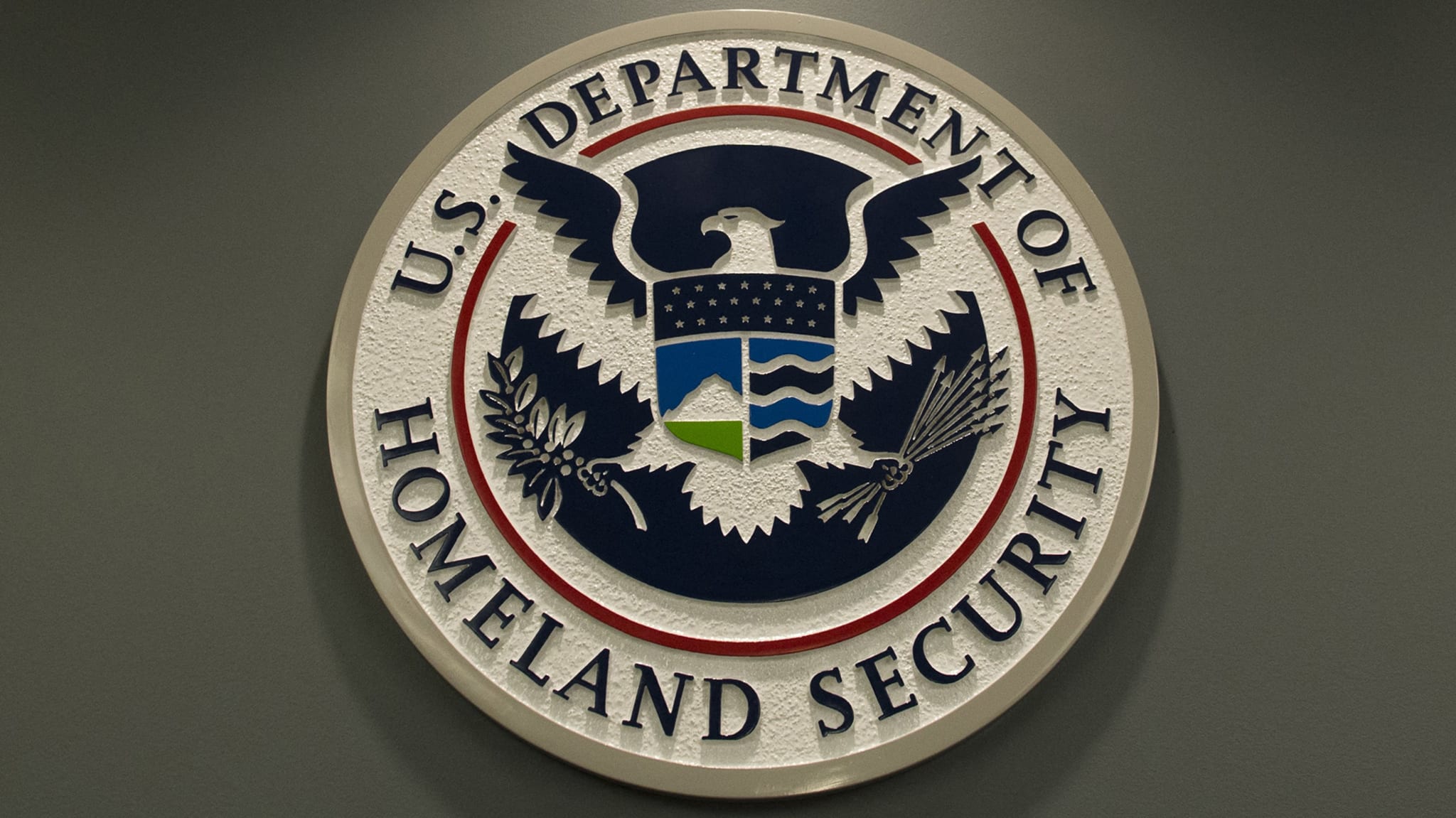 Seal of the U.S. Department of Homeland Security featuring an eagle, shield, and various symbols representing security and protection.