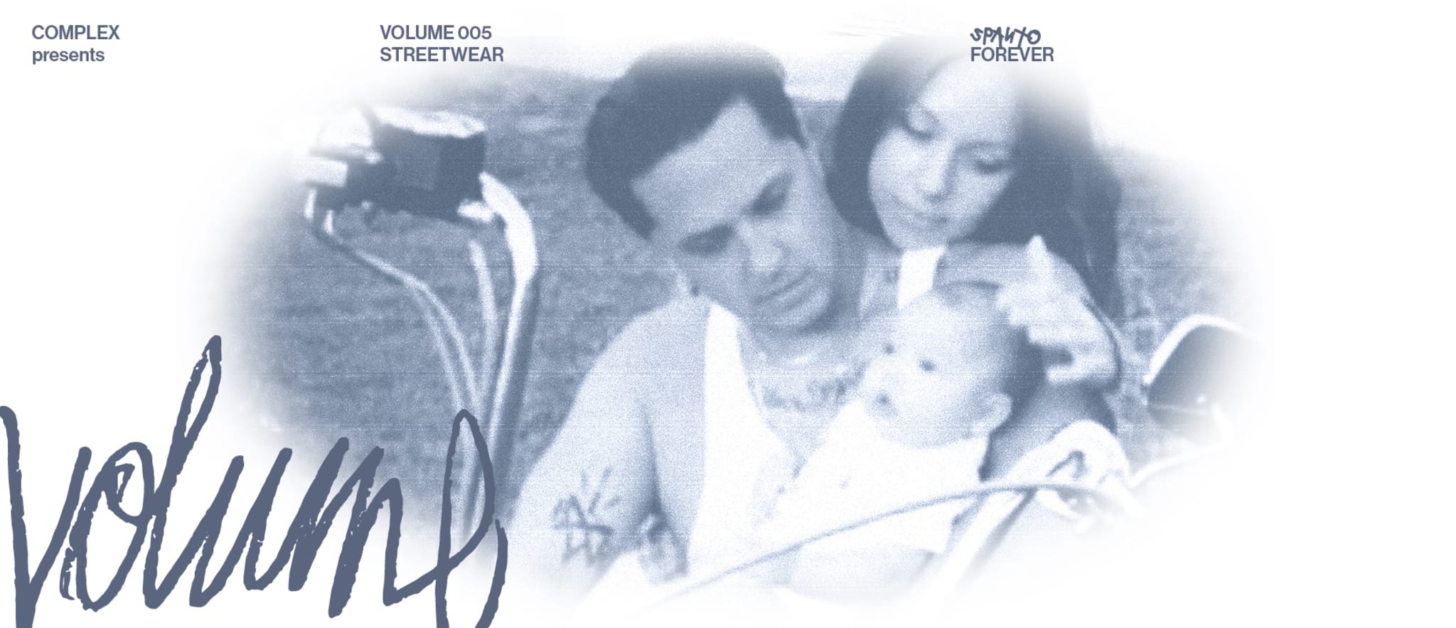 Chris Spanto Printup holding his child with his wife Anna.