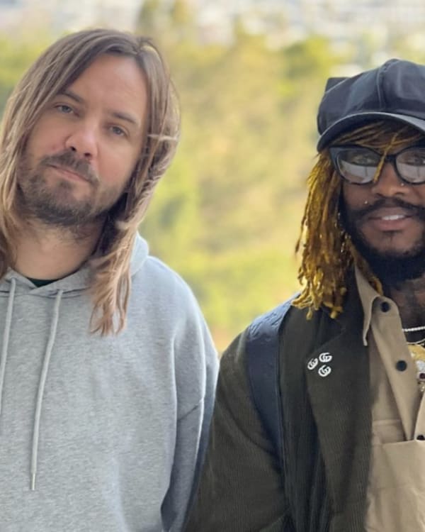 This is an image of Tame Impala and Thundercat