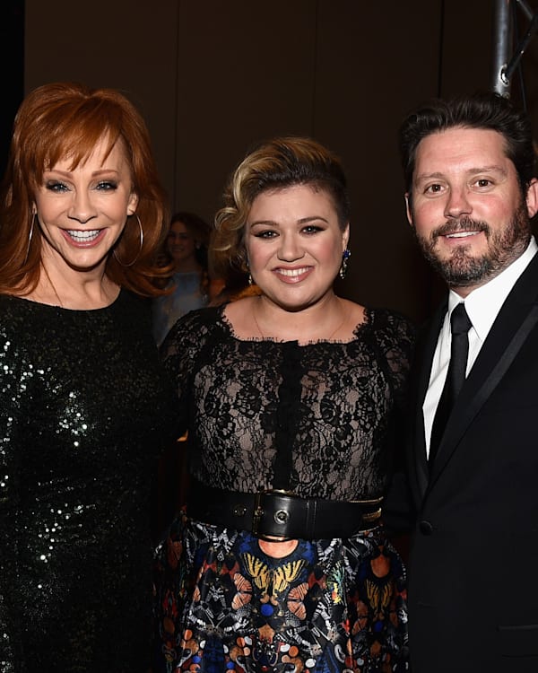TV Producer Narvel Blackstock, singers Reba McEntire, Kelly Clarkson and Brandon Blackstock attend Muhammad Ali's Celebrity Fight Night XXI at the JW Marriott Phoenix Desert Ridge Resort & Spa on March 28, 2015 in Phoenix, Arizona.