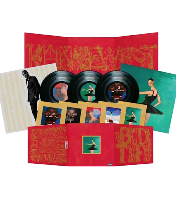 Vinyl record set of Kanye West's "The College Dropout" album with cover art featuring a bear mascot and additional album artwork.