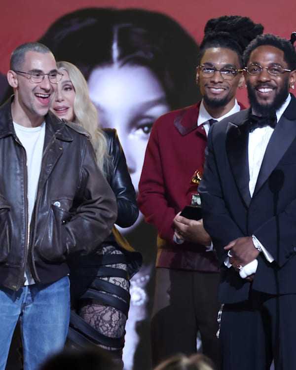 Cher (2rd L) presents the Record Of The Year award for "luther" to (from L) Jack Antonoff, Scott Bridgeway, Kendrick Lamar, Kamasi Washington, and SZA onstage during the 68th GRAMMY Awards at Crypto.com Arena on February 01, 2026 in Los Angeles, California