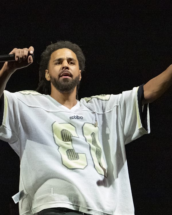 RALEIGH, NORTH CAROLINA - APRIL 6: J. Cole performs onstage during the 2025 Dreamville Music Festival at Dorothea Dix Park on April 6, 2025 in Raleigh, North Carolina.