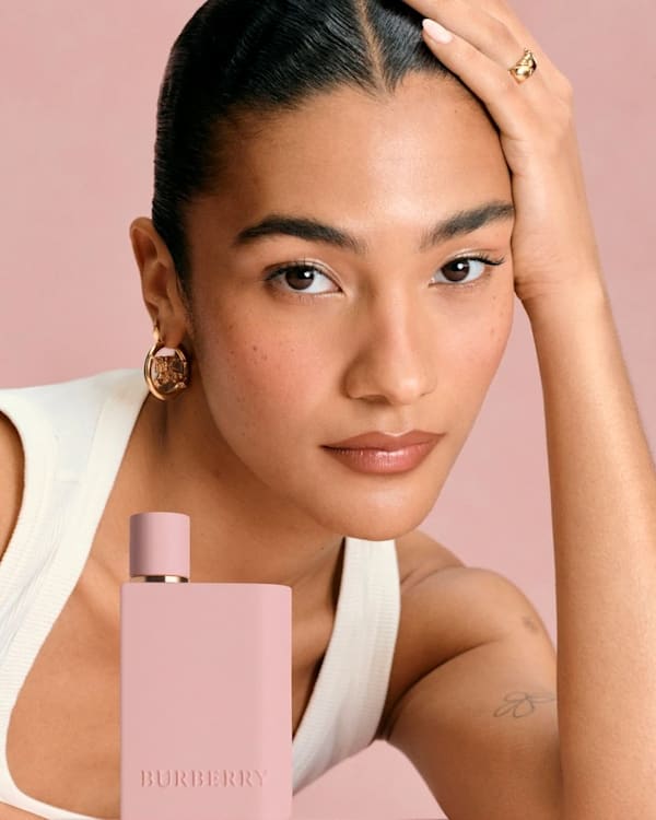 Olivia Dean is the face of Burberry's new "Her" fragrance campaign.