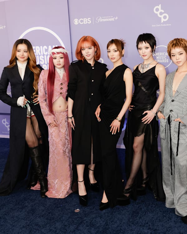The seven members of XG in stylish outfits pose on the left. Teyana Taylor in a purple gown posing on the right at a red carpet event.
