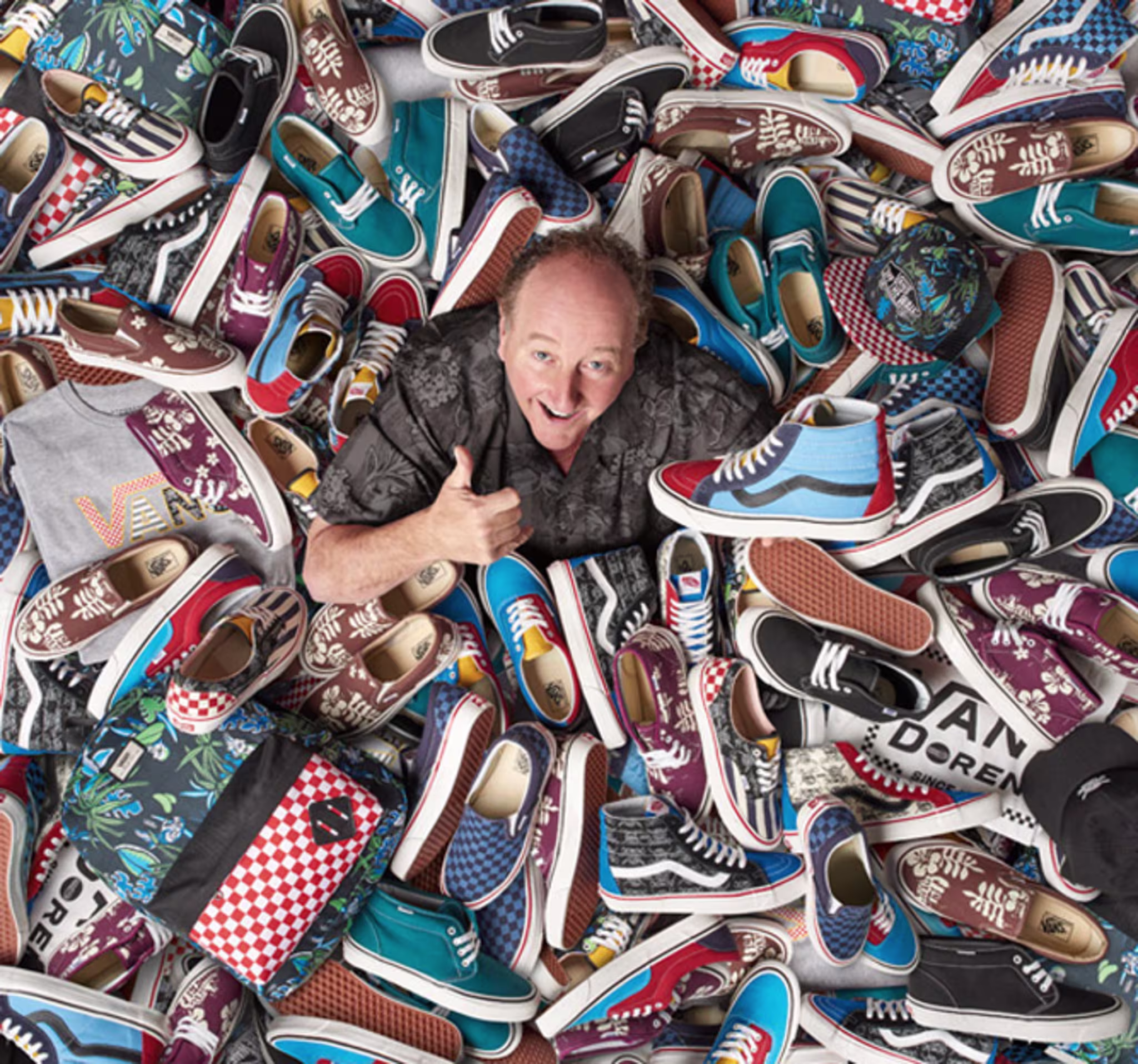 Steve Van Doren in a pile of Vans sneakers