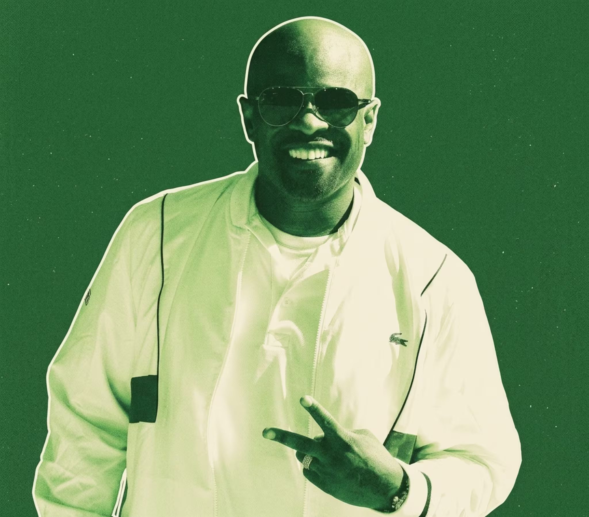 Case in a white jacket and sunglasses smiles, making a peace sign, with a green filter over the image.