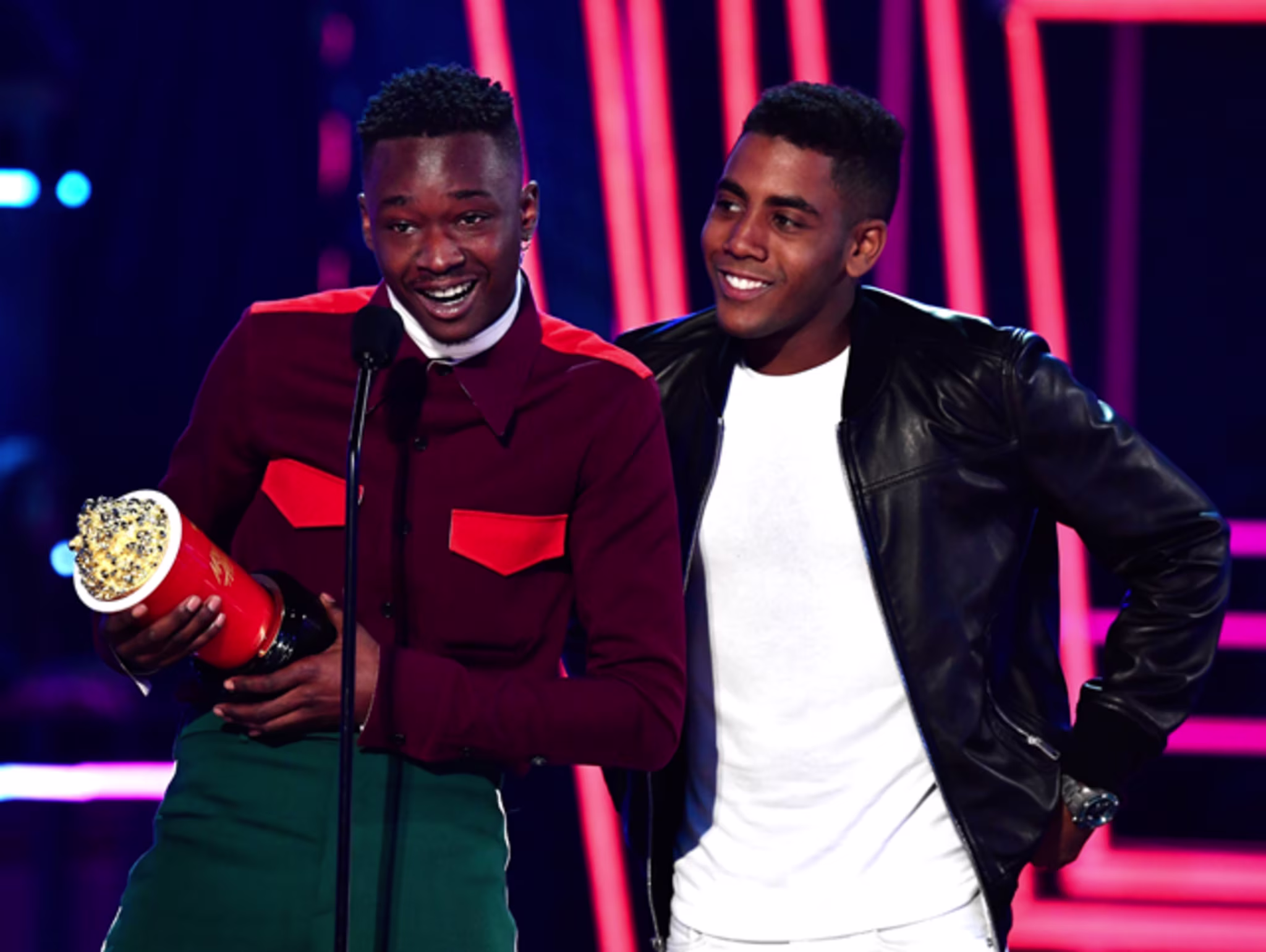 Ashton Sanders and Jharrel Jerome accept the "Best Kiss" MTV Movie Award