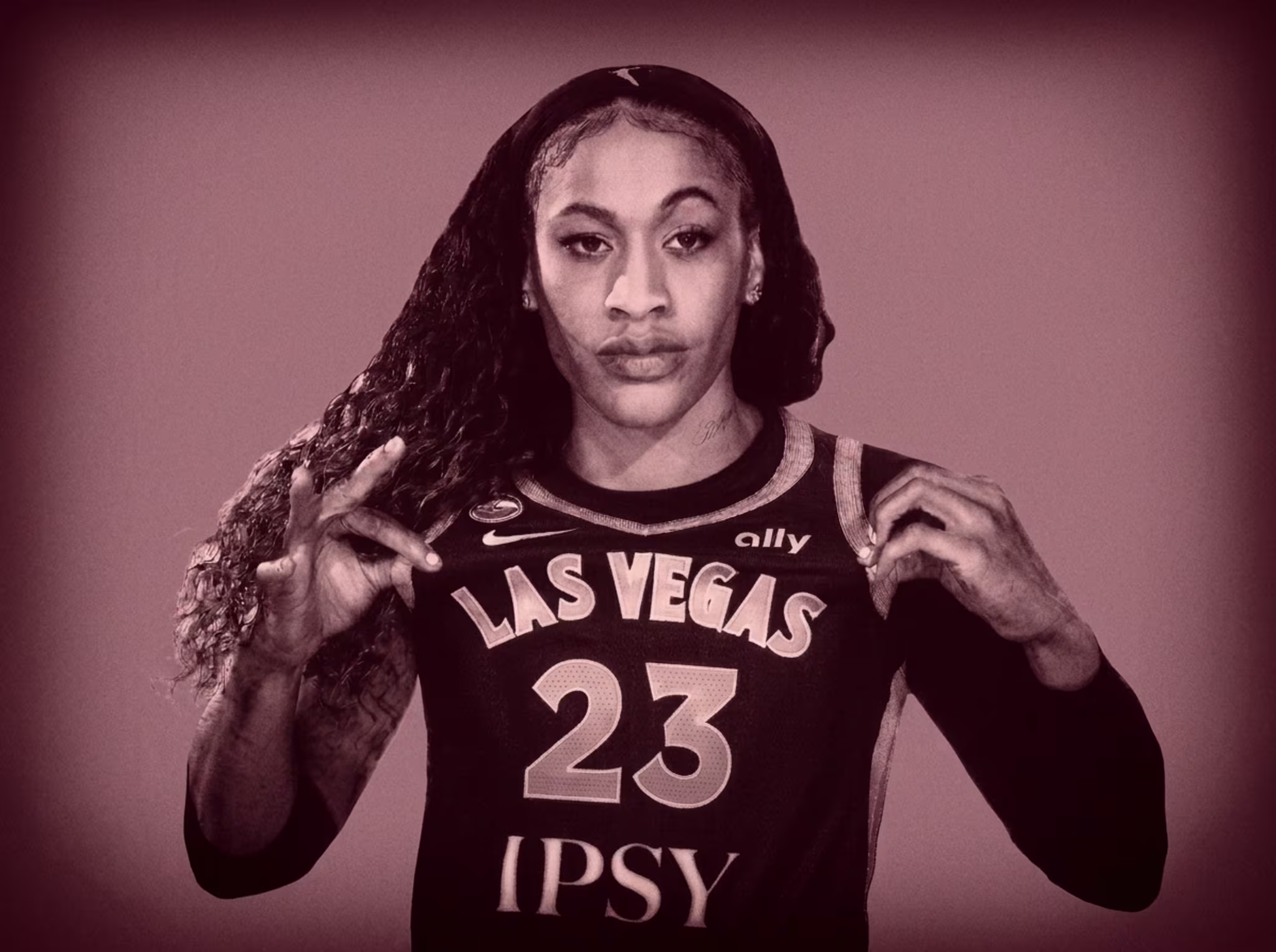 Chennedy Carter poses at Las Vegas Aces media day in April 2026. 