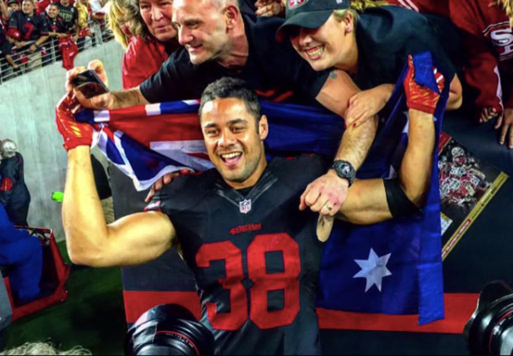 Jarryd Hayne celebrates with Aussie 49ers fans