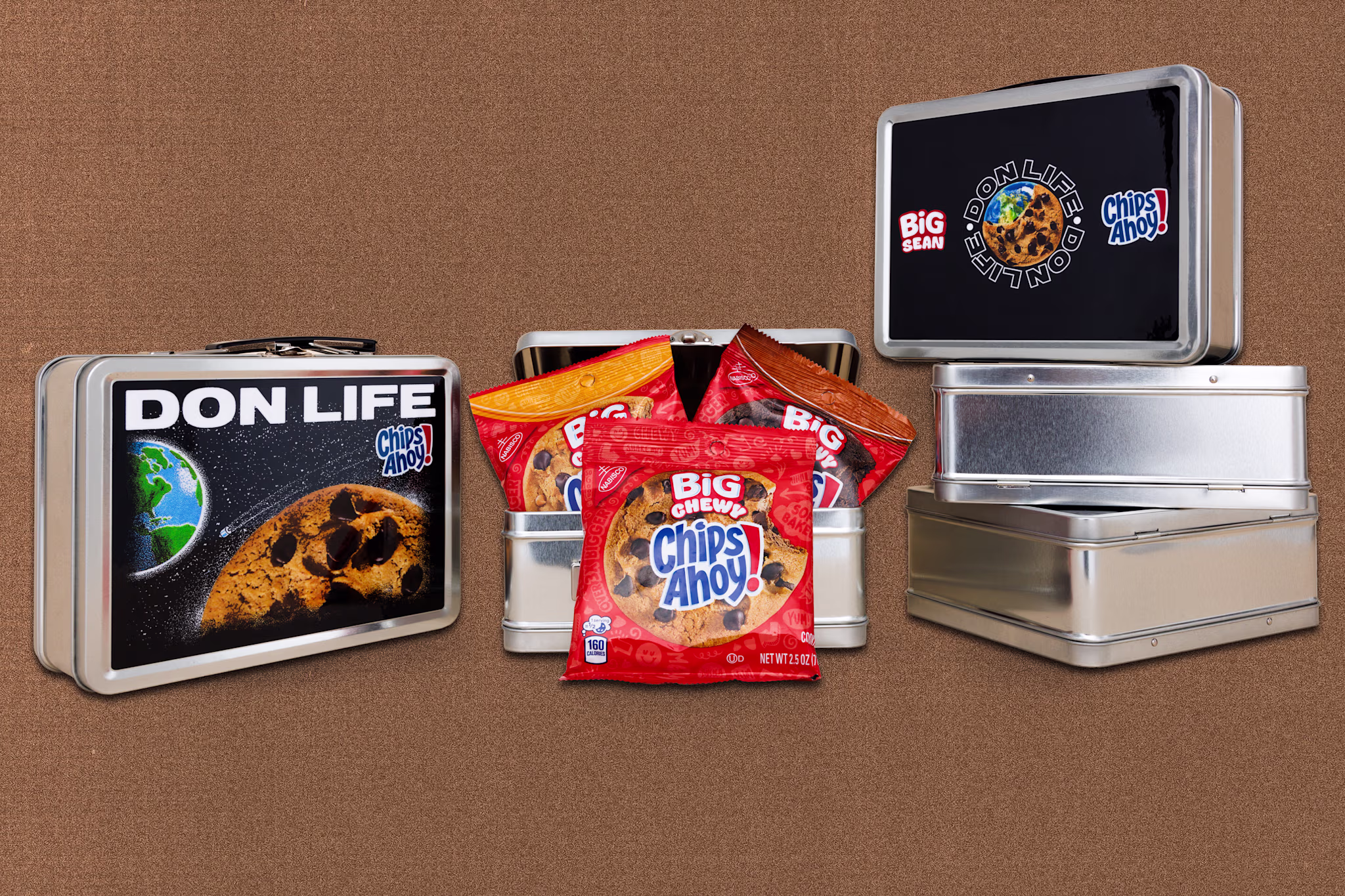 Metal lunchboxes labeled "DON LIFE" and "Big Sean" with Chips Ahoy! branding, surrounded by cookie packs.
