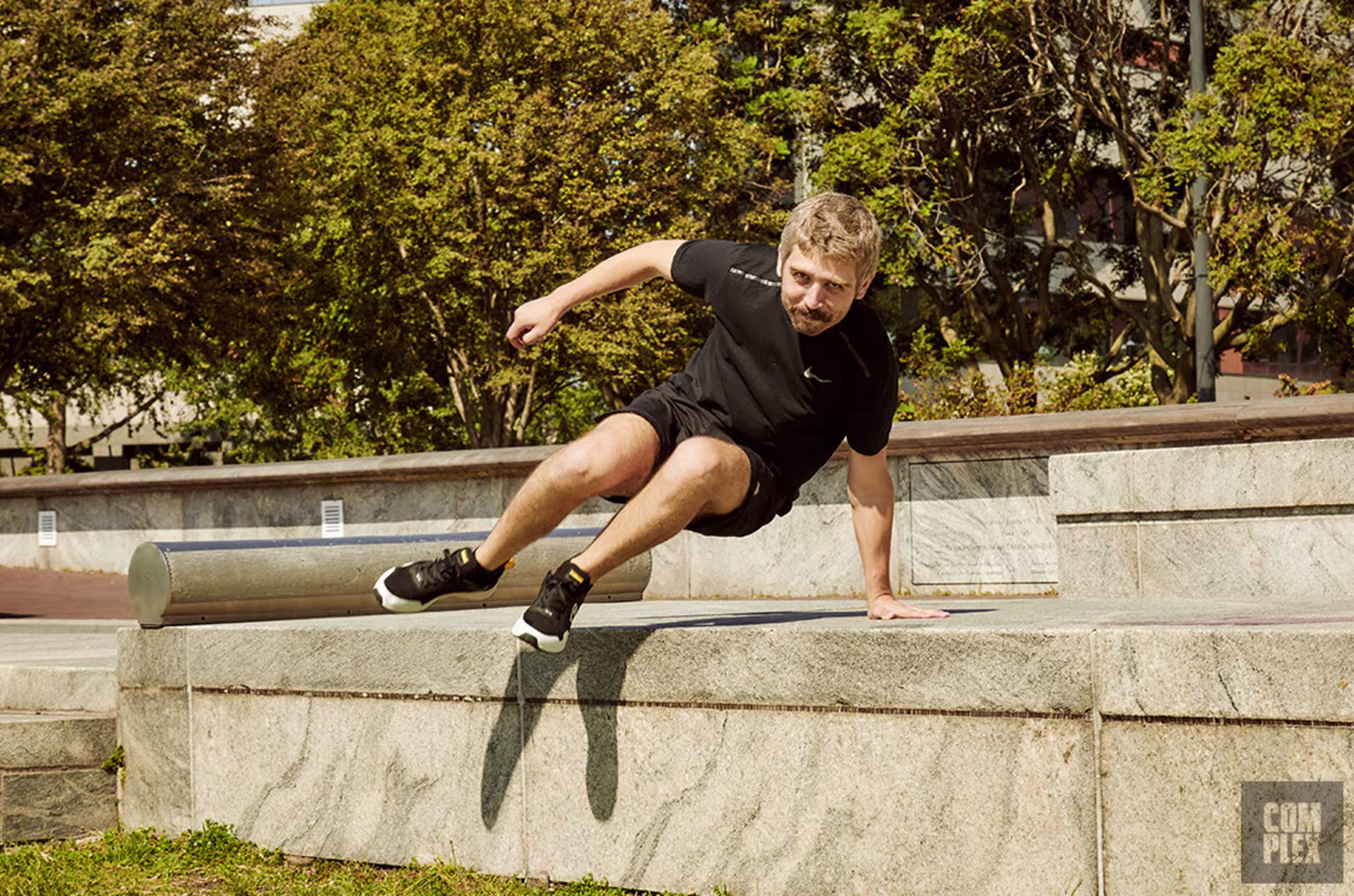 Parkour Jump Over Concrete Ledge