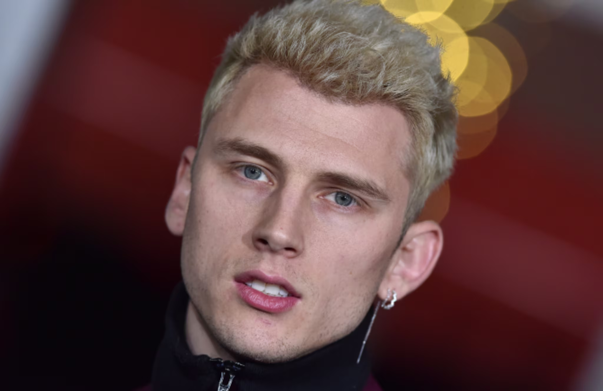 Rapper Machine Gun Kelly arrives at the premiere of Netflix's 'Bright'