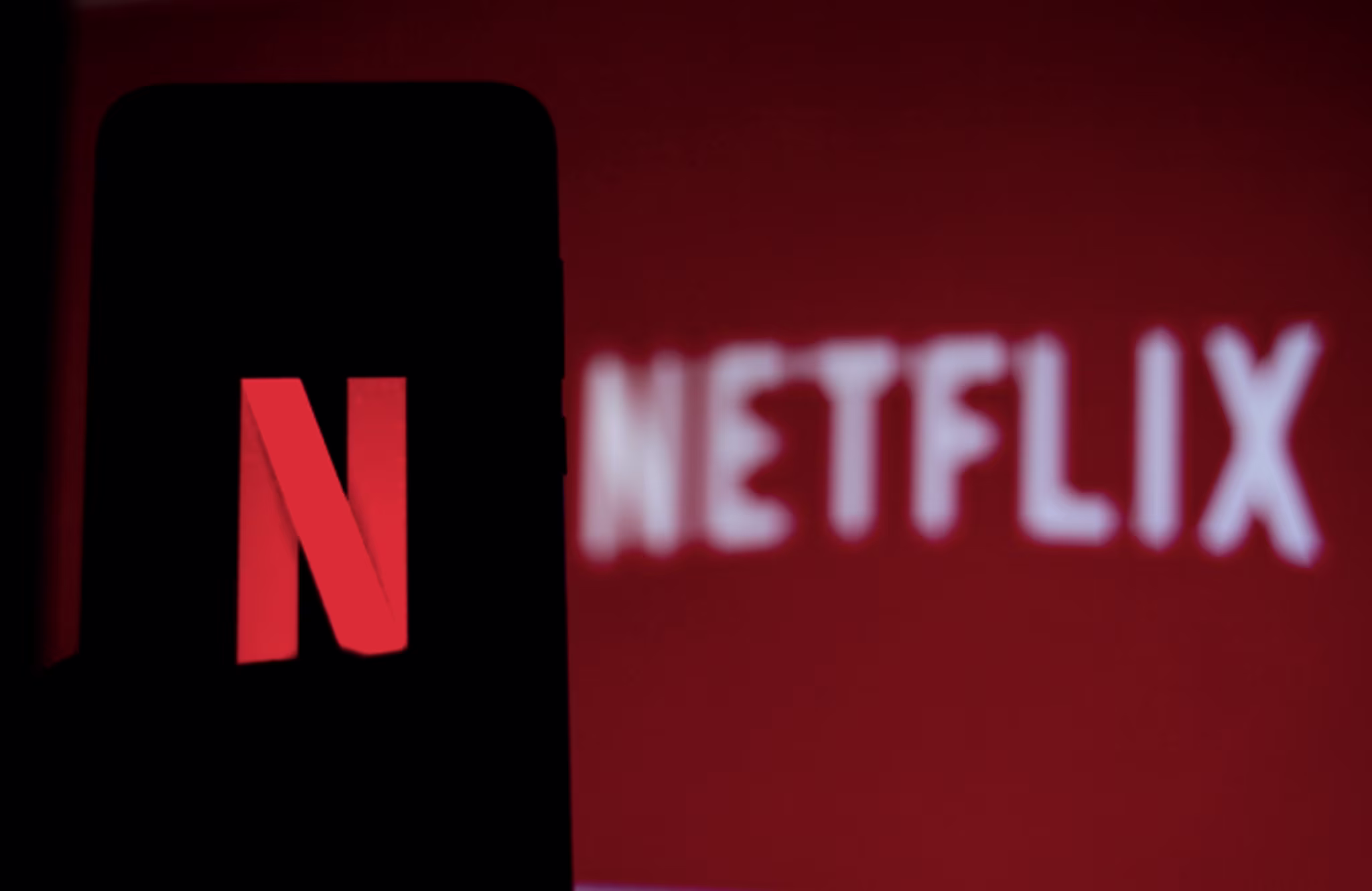 In this photo illustration the Netflix logo