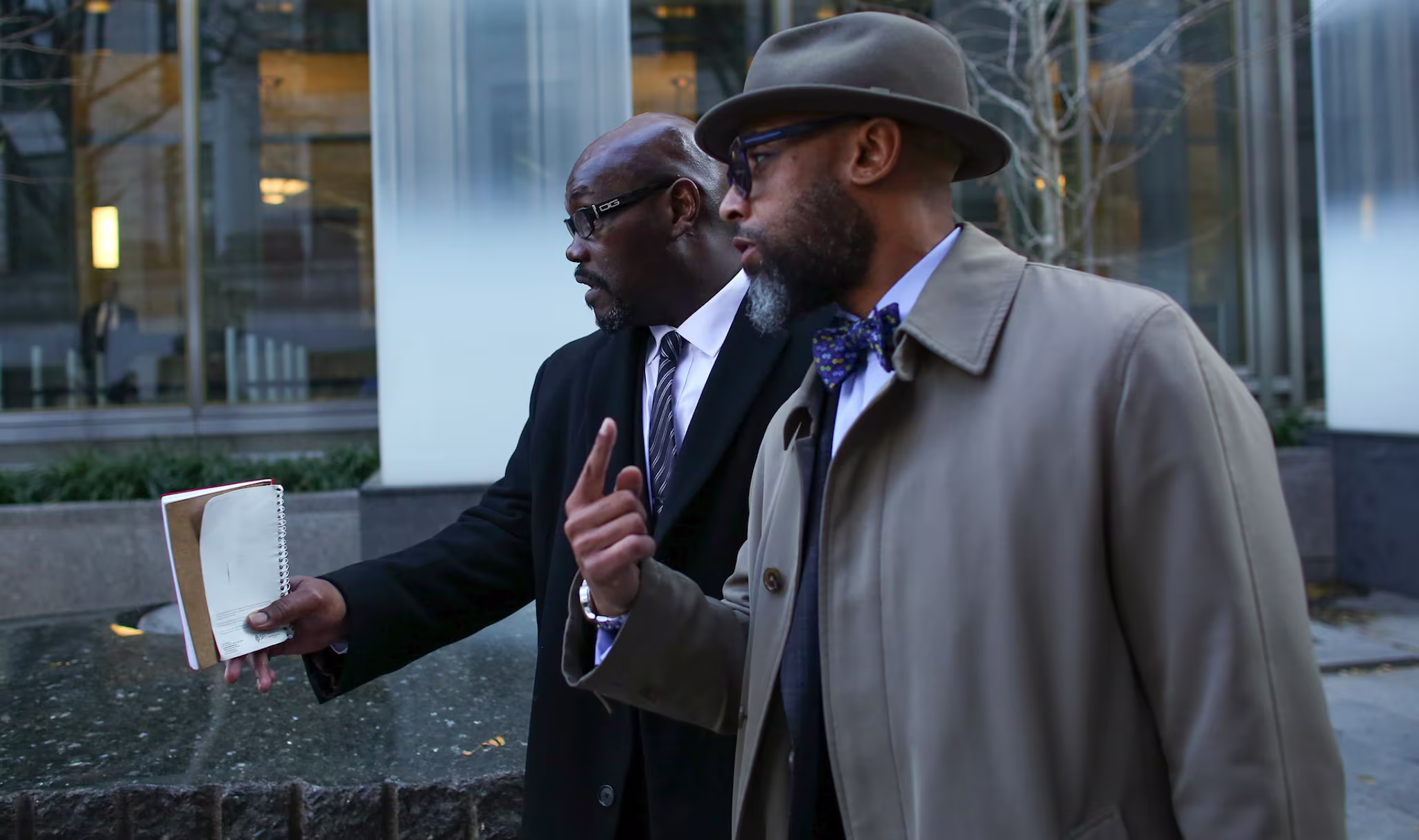 One of Jeffrey Epstein's prison guards exits a Manhattan court room