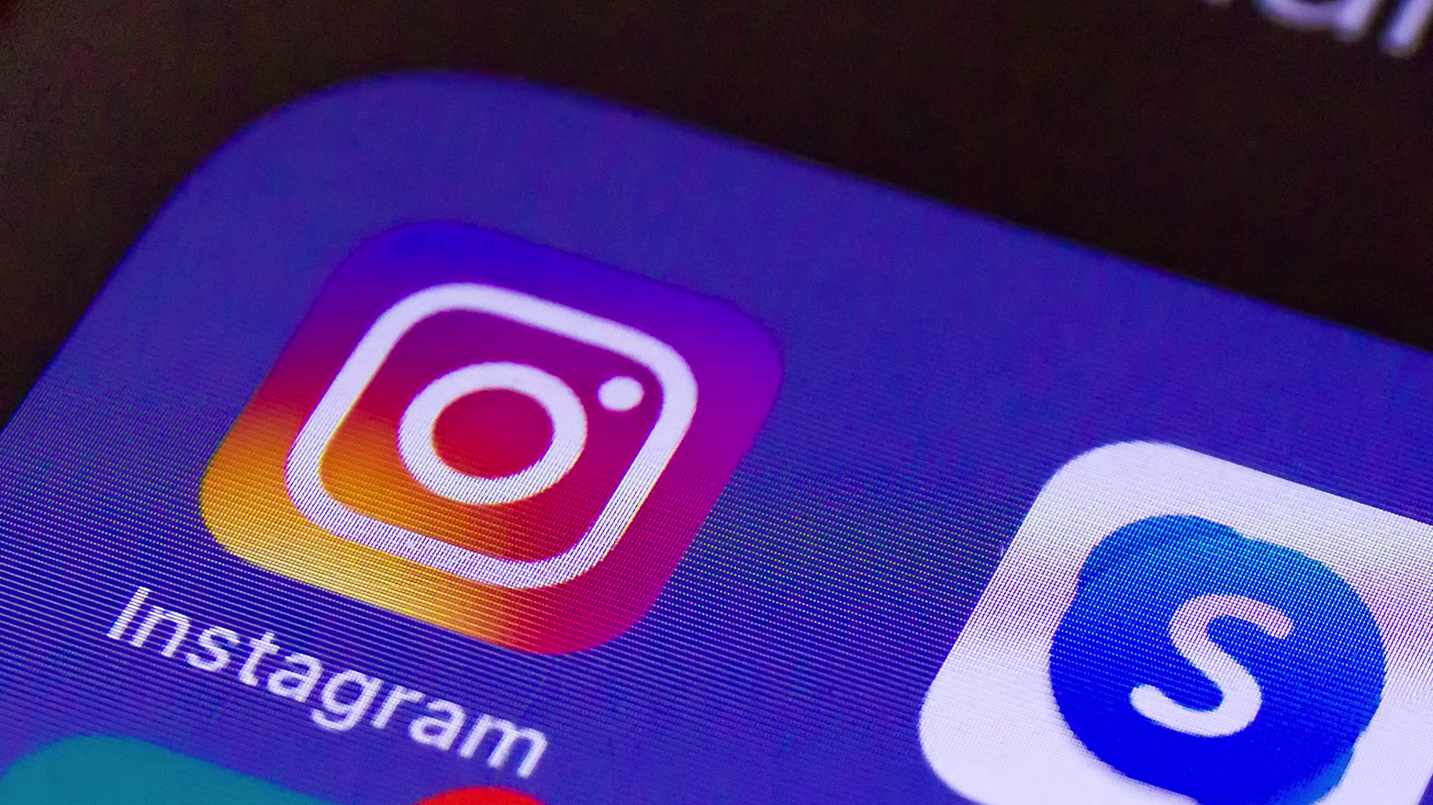 A smartphone screen is seen with the Social Media apps