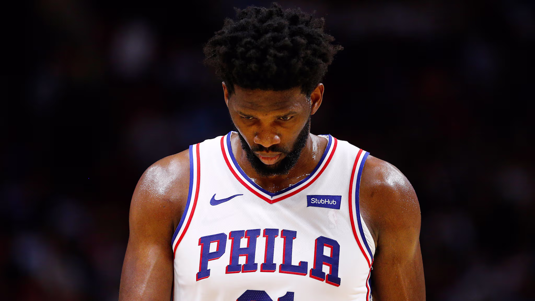Joel Embiid reacts against the Miami Heat during the first half.