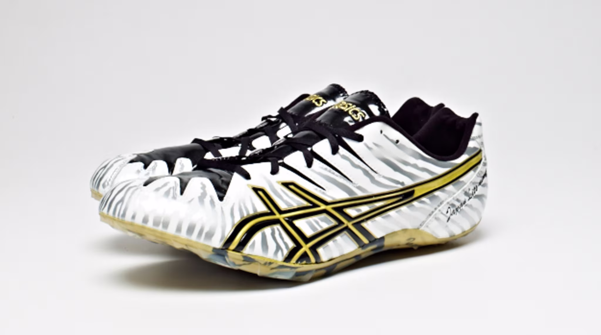 The Asics Japan Lite Ning 4 Track Spike