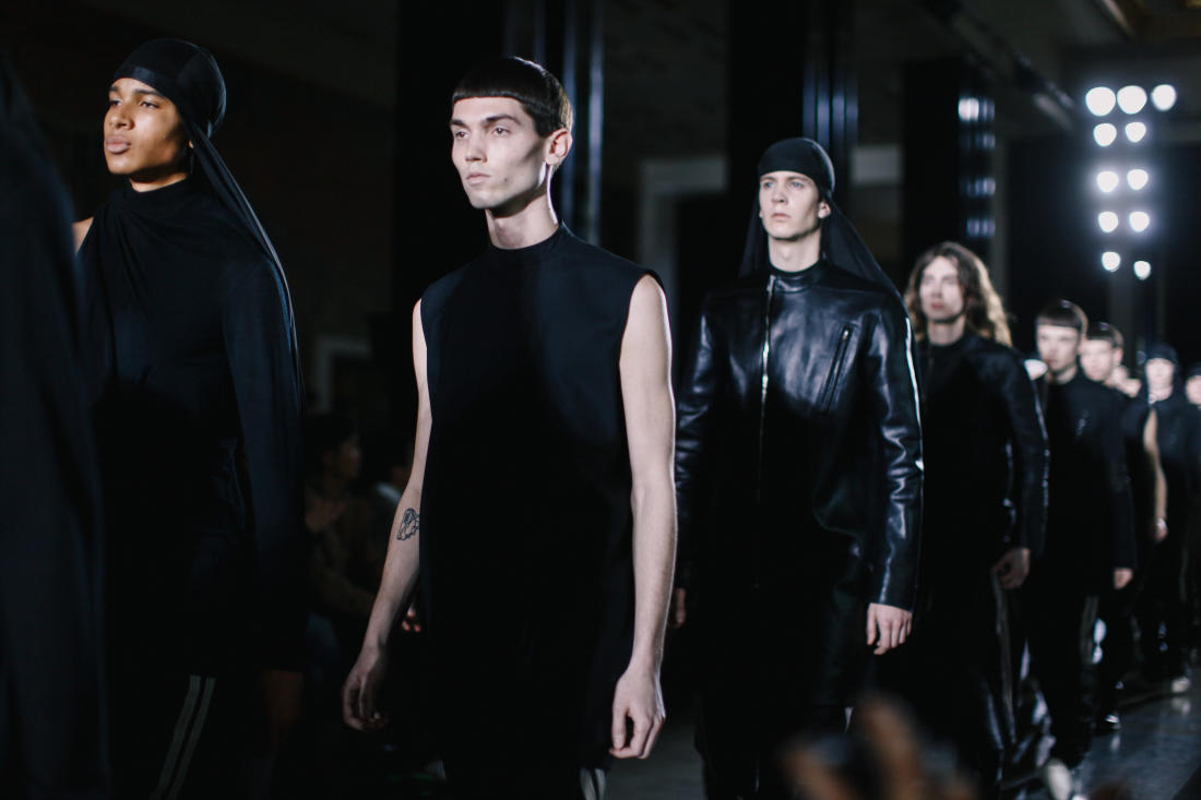 A line of models from Rick Owens' Fall/Winter 2014 menswear show decked ...