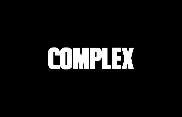 The image shows the word "COMPLEX" in bold white letters on a black background.