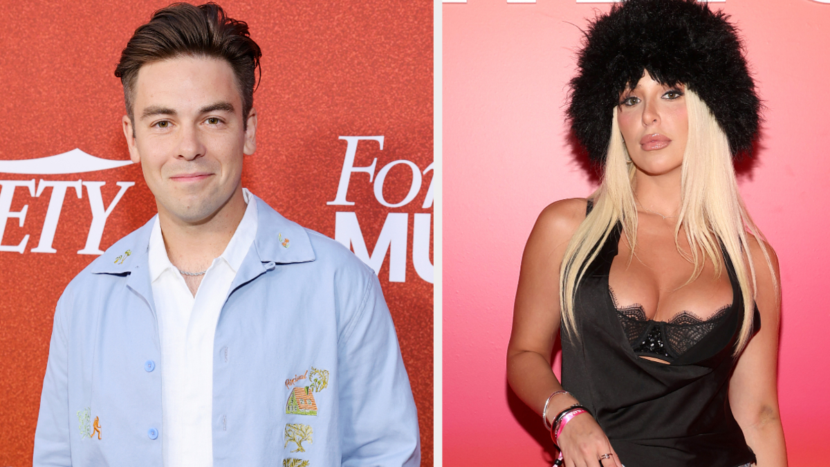 Cody Ko in a light blue shirt and Tana Mongeau in a stylish black outfit with a fur hat, appearing at a pop culture event