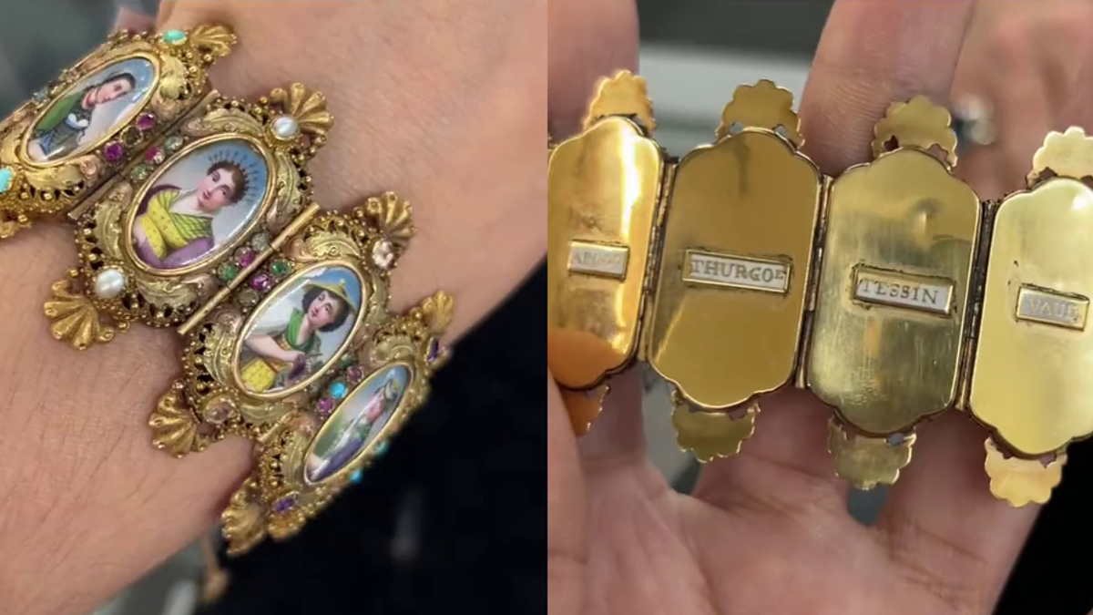 A close-up of an ornate gold bracelet with small, detailed portraits of historical figures on one side and engraved names on the other side