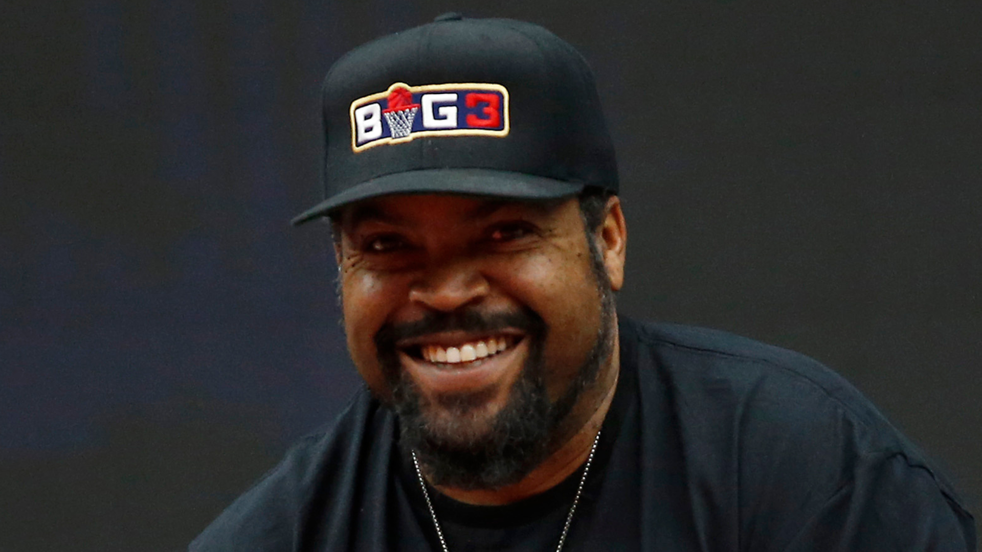 Ice Cube sitting courtside.