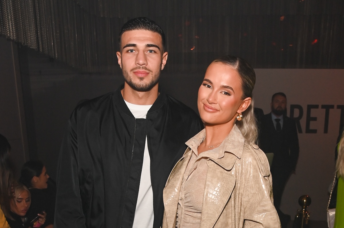 Tommy Fury and Molly-Mae Hague attend the PrettyLittleThing X Molly-Mae show at The Londoner Hotel on February 16, 2022 in London, England.