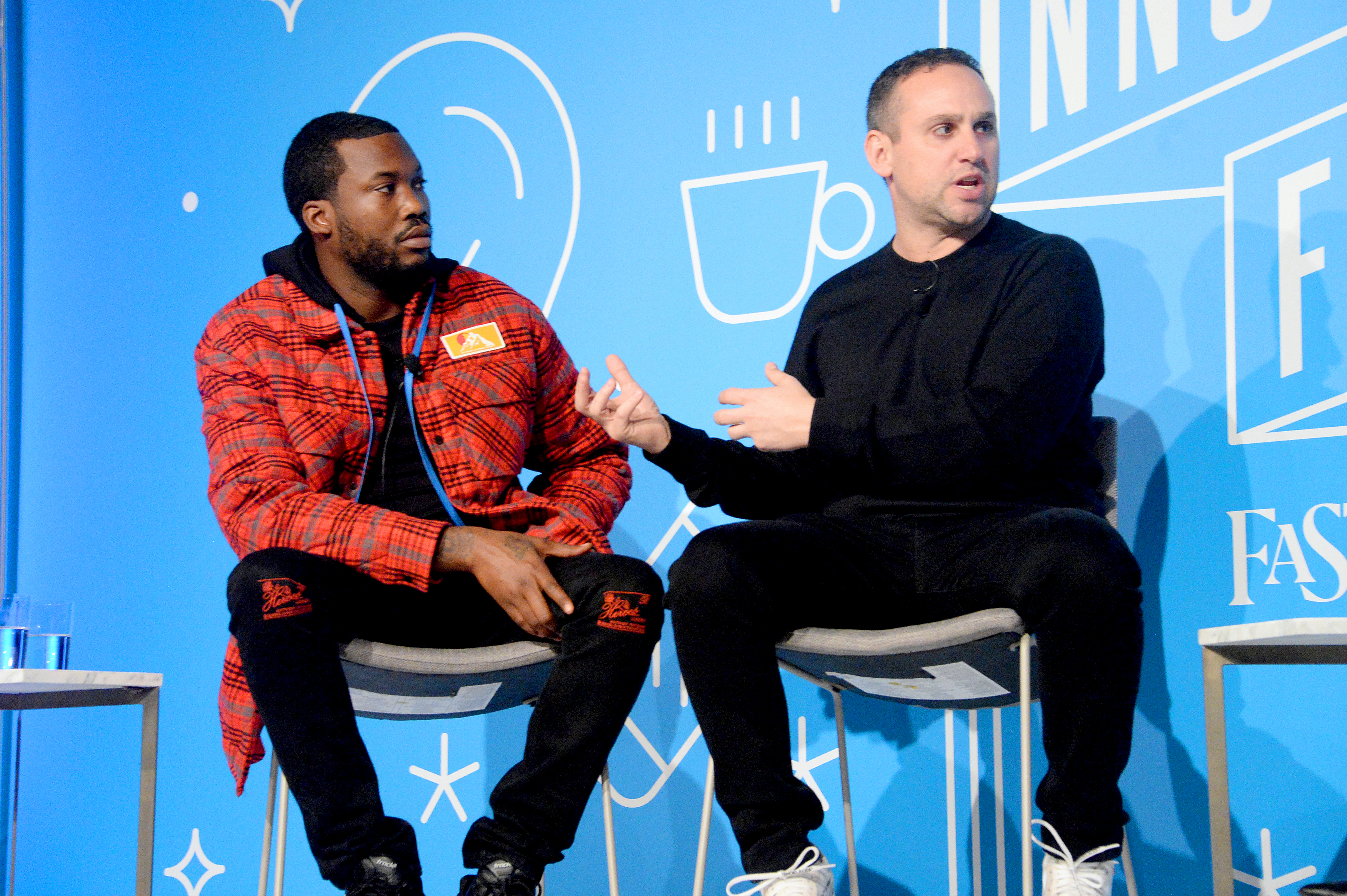 NEW YORK, NEW YORK - NOVEMBER 06: Meek Mill and Michael Rubin speak on stage at the "Justice for All: Reforming a Broken System" at the Fast Company Innovation Festival - Day 2 on November 06, 2019 in New York City