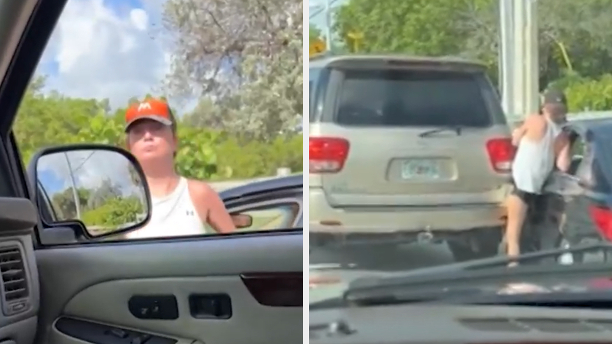 A woman wearing a white tank top and orange Miami Marlins cap stands beside a car during a traffic stop