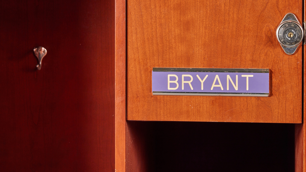 A locker with a nameplate reading "Bryant" on it