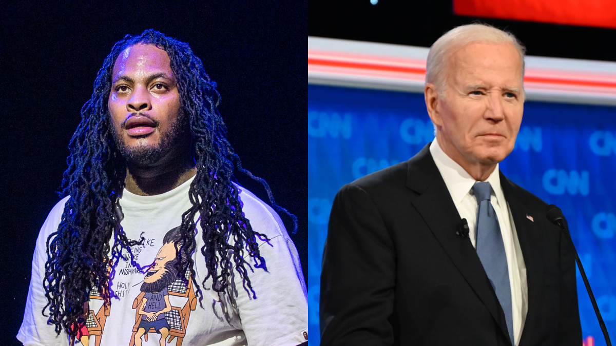 Waka Flocka Flame in a printed t-shirt stands beside Joe Biden in a suit and tie on the CNN news stage